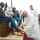 The foot-washing ritual at the Castelnuovo di Porto refugees center.